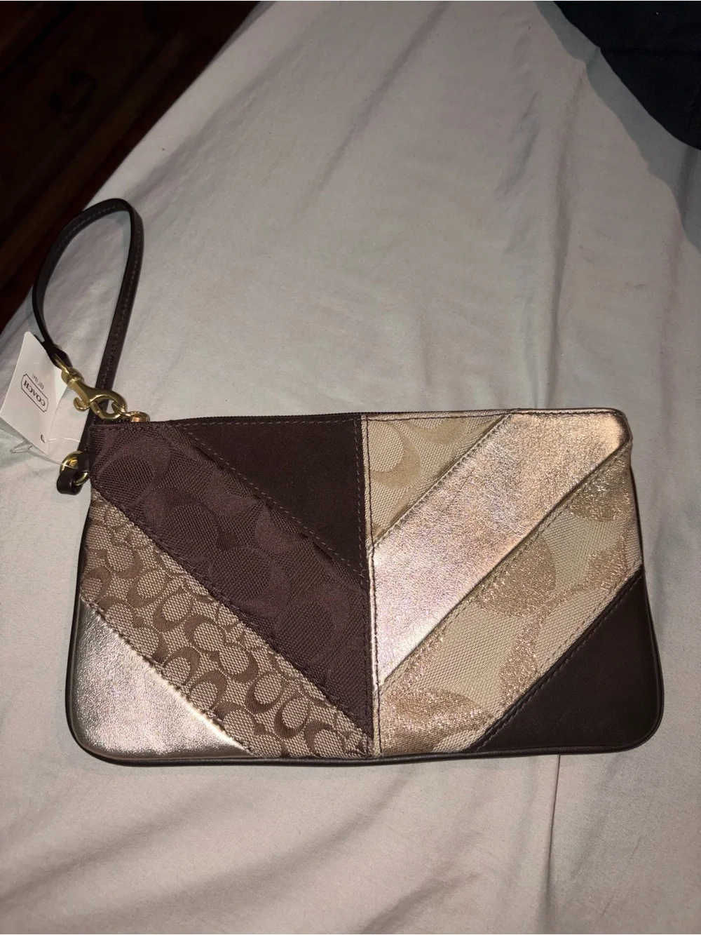 Coach Patchwork Wristlet in Brown and Metallic Rose